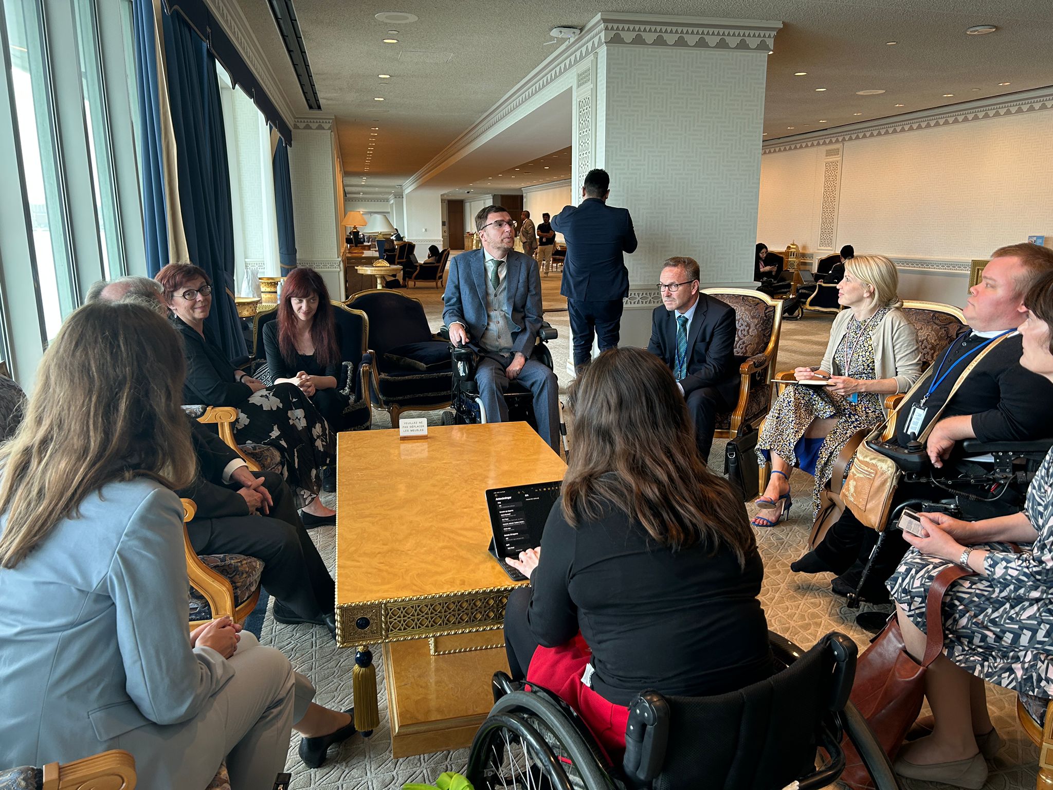 A group of people around a a table